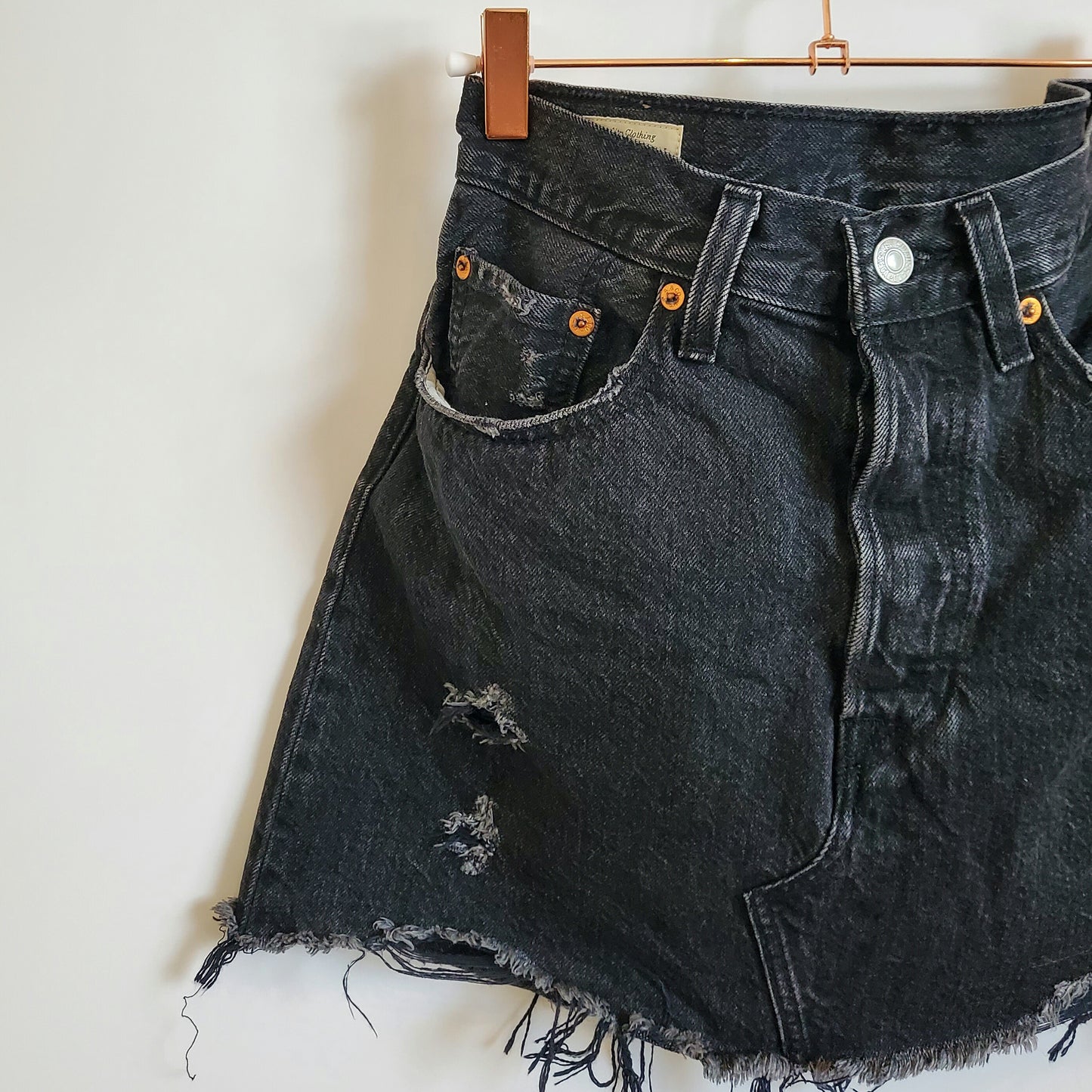 Preloved Distressed Levi's Mini Denim Skirt | Size 8